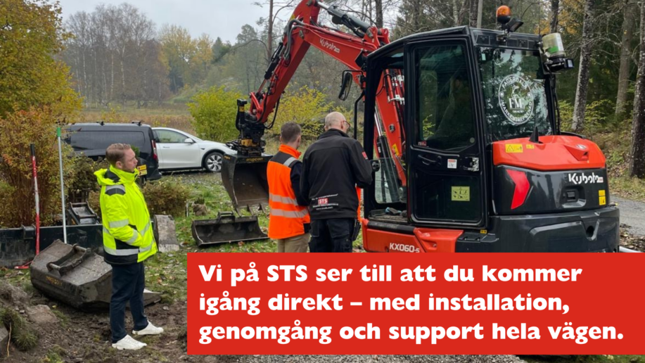 Tekniker från STS visar iDig grävsystem vid grävmaskin under installation eller demo ute på arbetsplats.